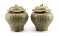 A Pair of Chinese Celadon Glazed Covered Vases Height 14 inches.