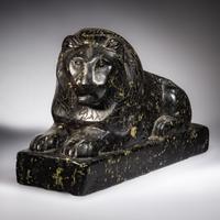An Egyptian Black Marble Recumbent Lion