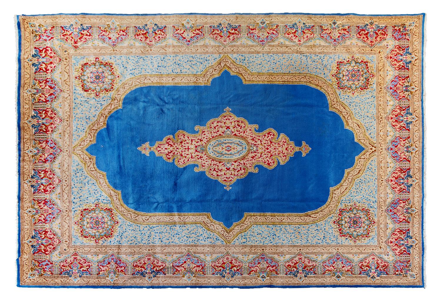 A Kirman Wool Rug 12 feet 3 inches x 8 feet 9 inches. — 20TH CENTURY