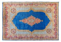 A Kirman Wool Rug 12 feet 3 inches x 8 feet 9 inches. — 20TH CENTURY