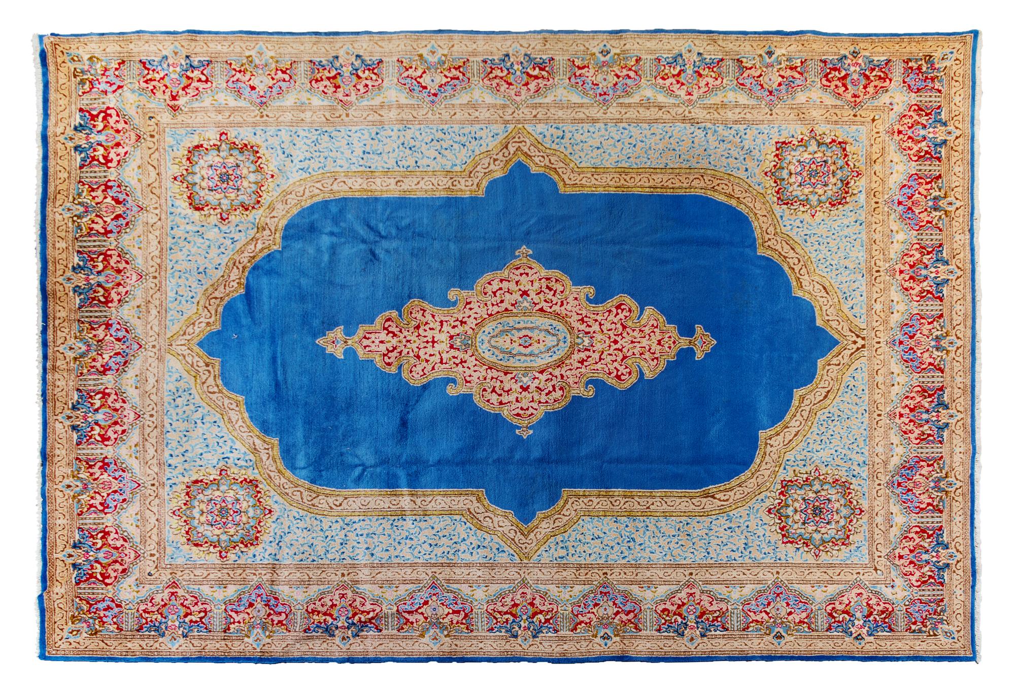 A Kirman Wool Rug 12 feet 3 inches x 8 feet 9 inches. — 20TH CENTURY