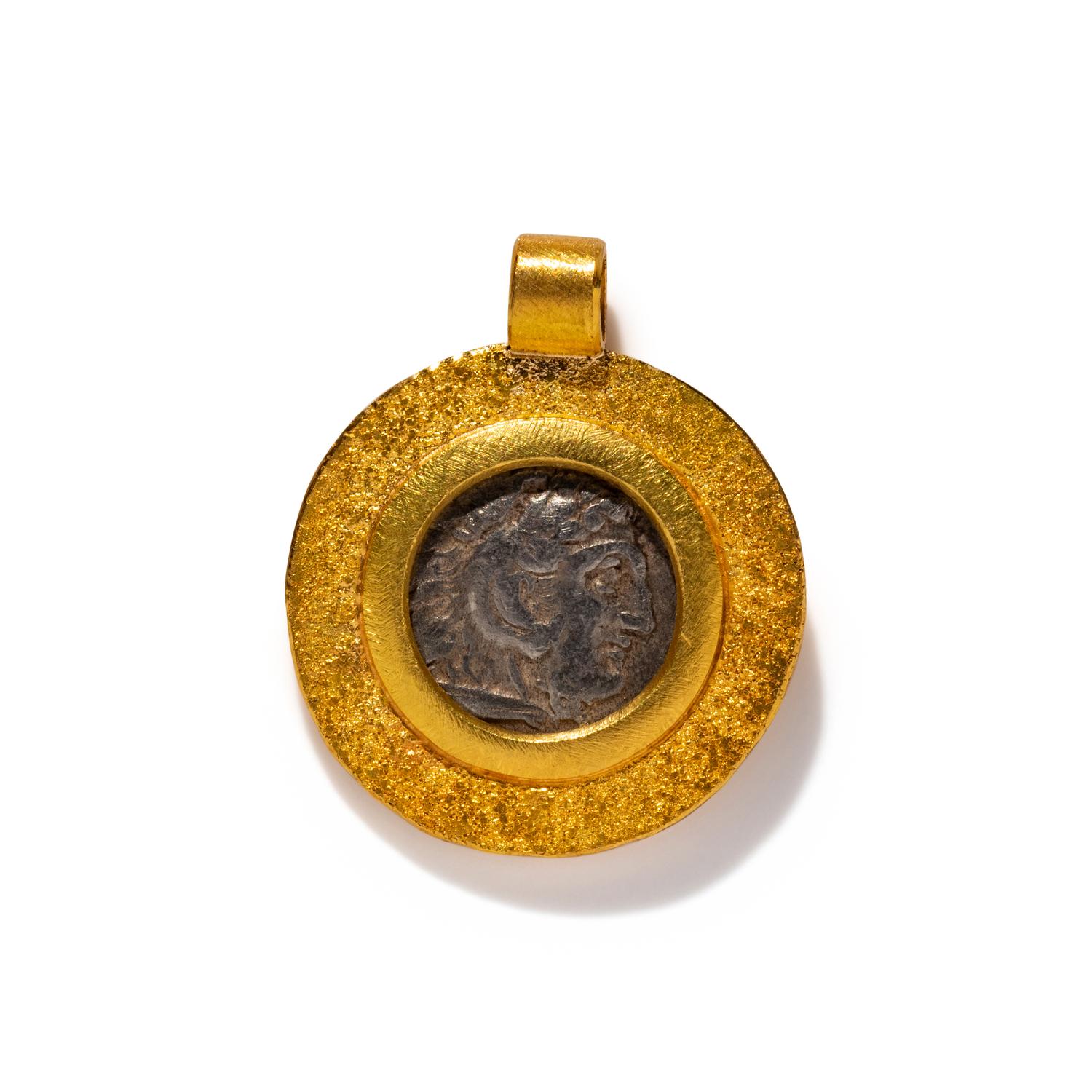 A Greek Silver Drachm with Alexander the Great — Set in a gold pendant