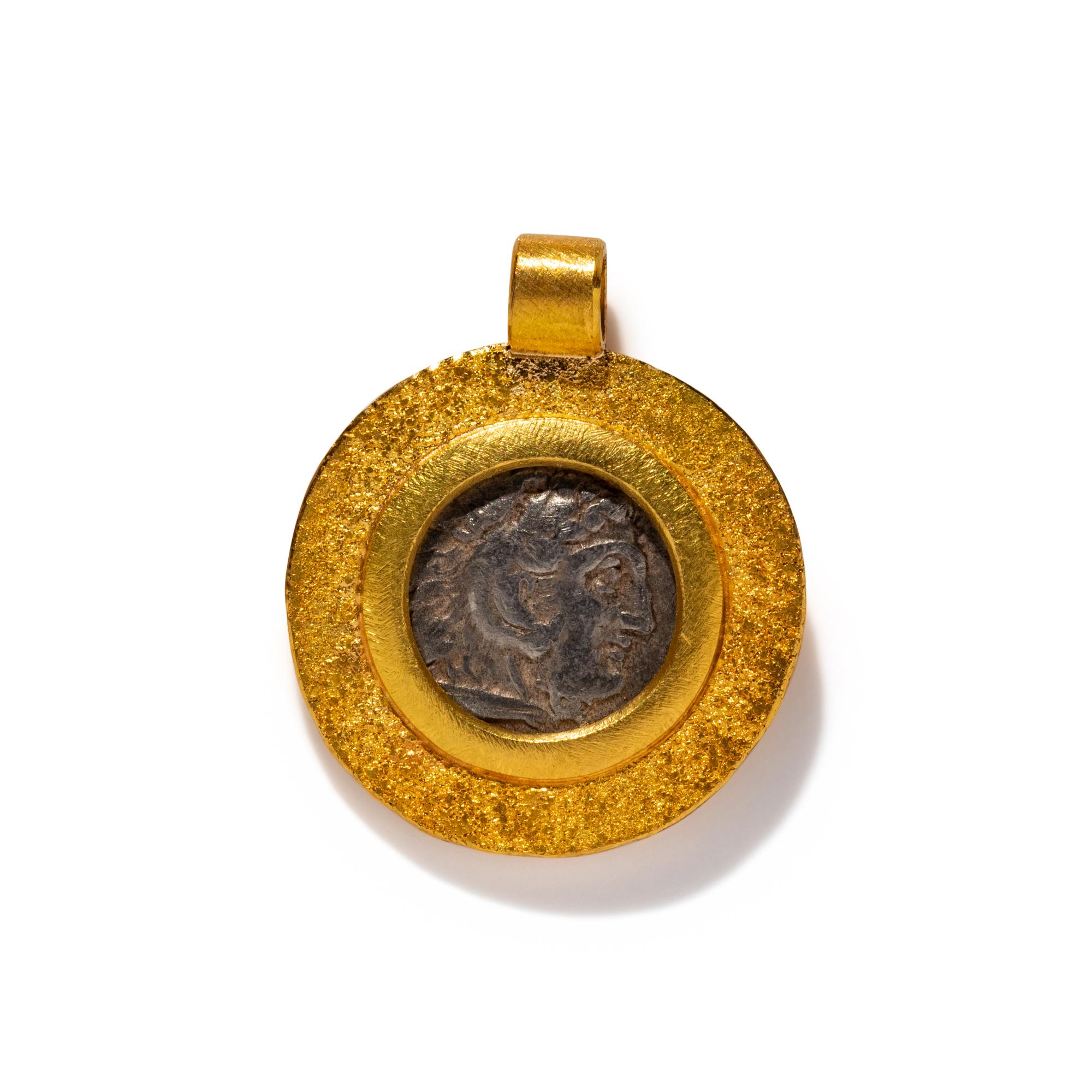 A Greek Silver Drachm with Alexander the Great — Set in a gold pendant