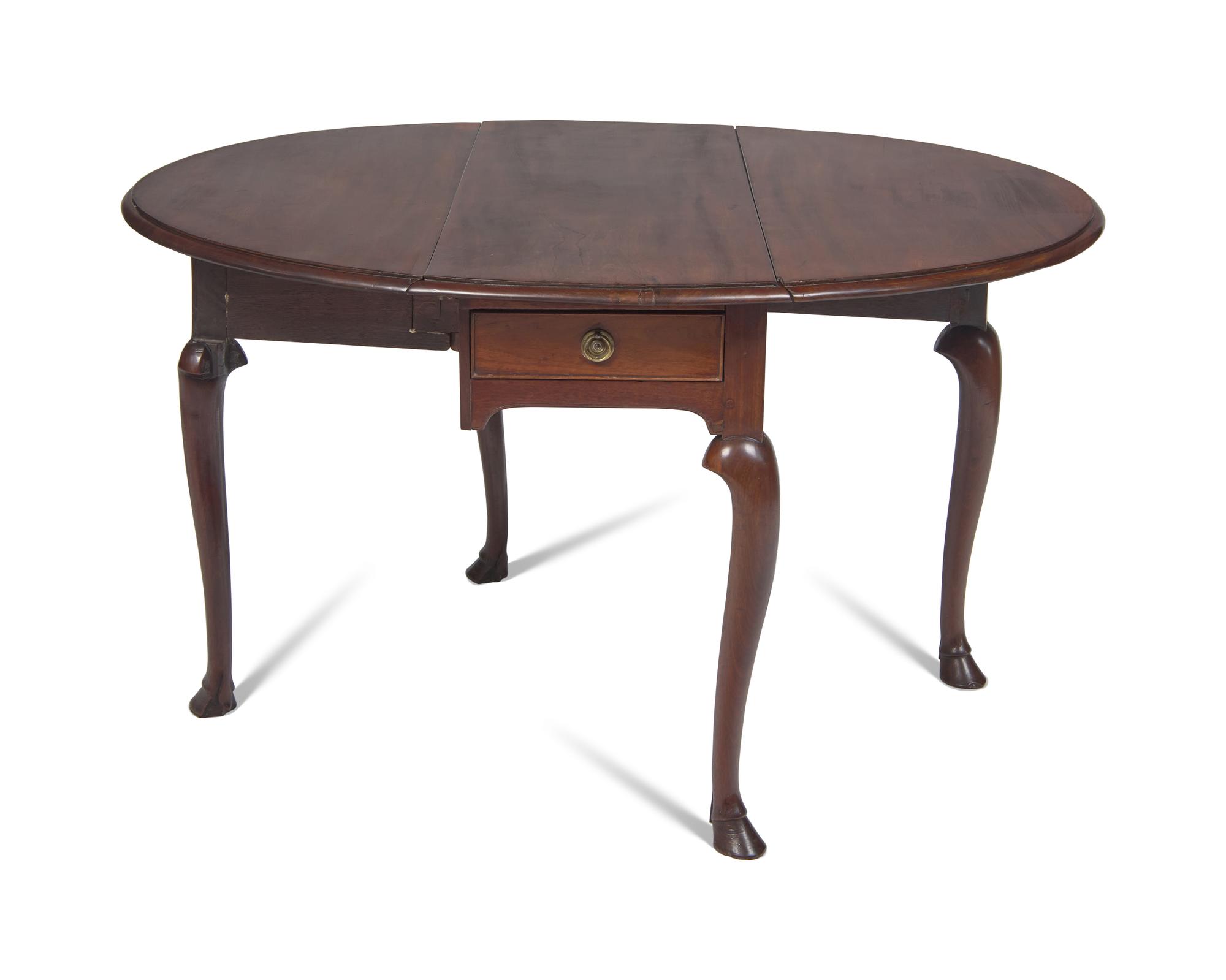 An Irish George II Mahogany Oval Drop-Leaf Table