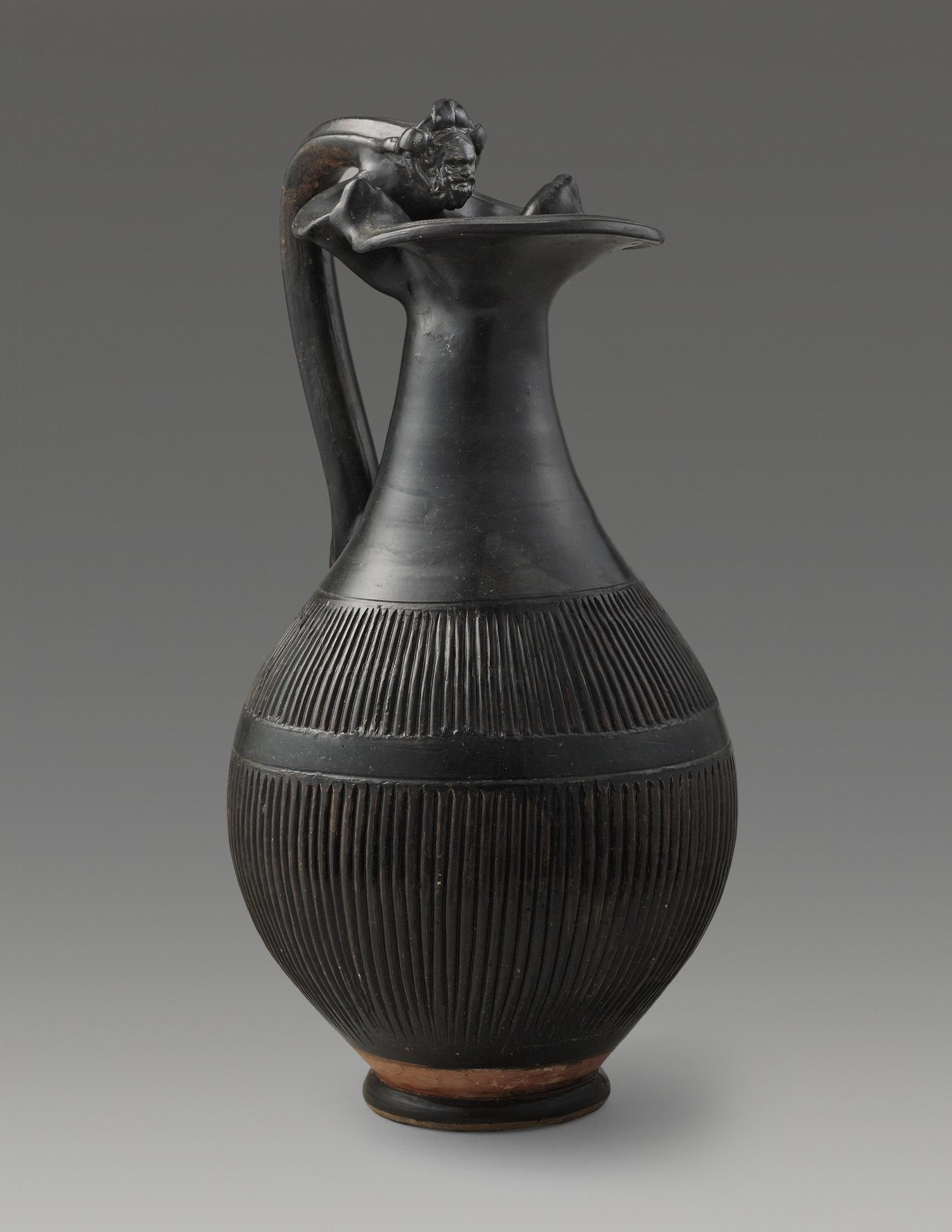 An Apulian Black-Glazed Oinochoe