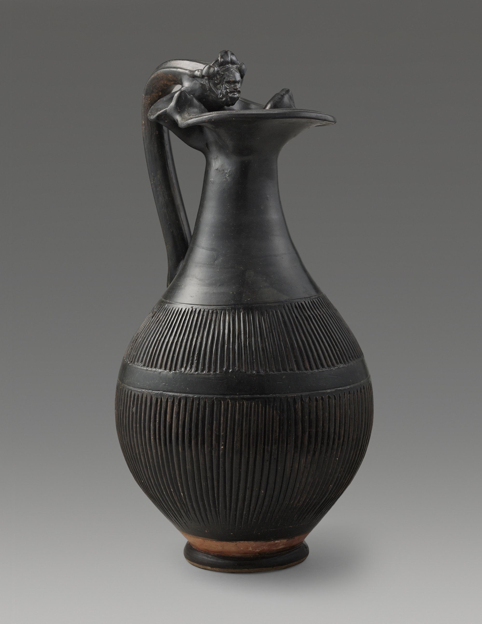 An Apulian Black-Glazed Oinochoe
