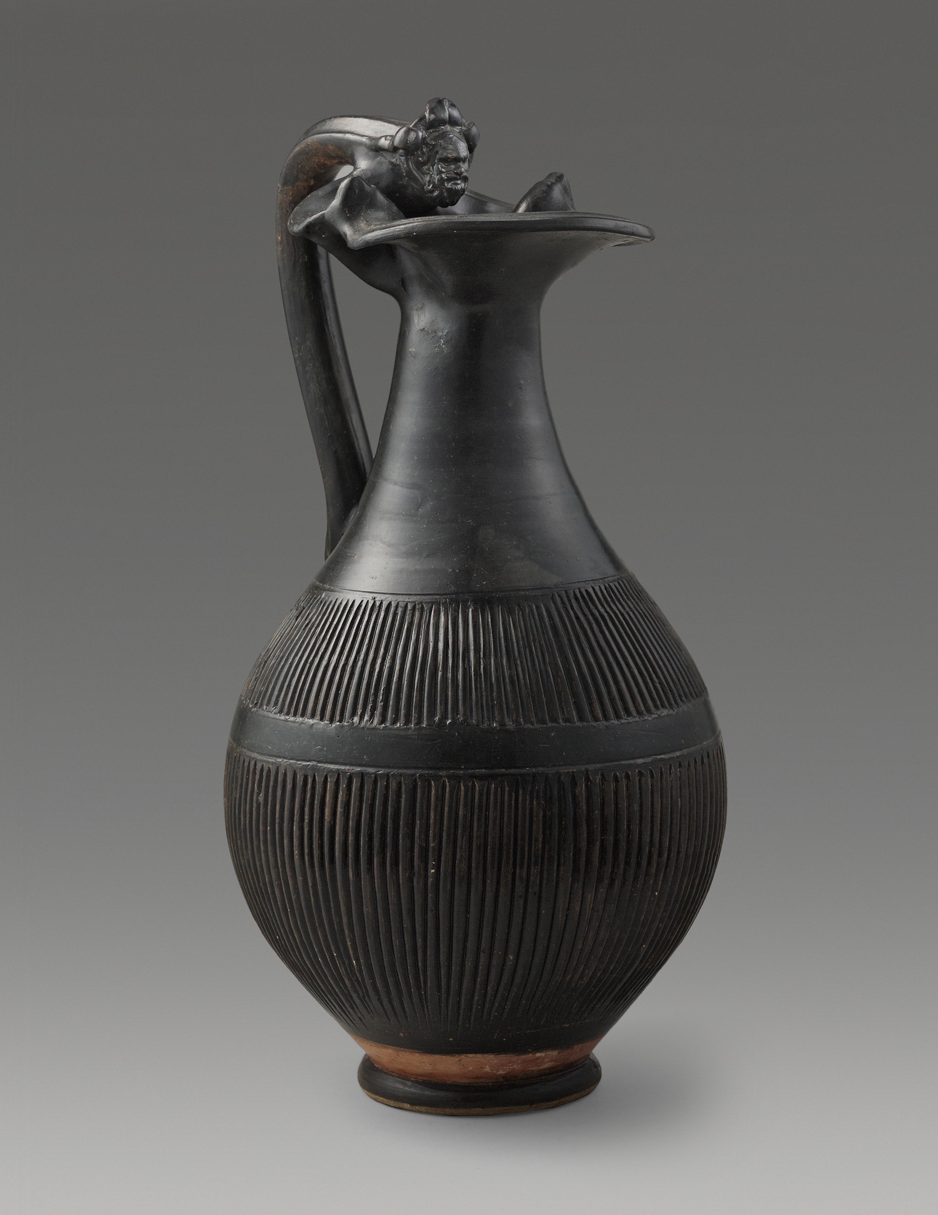 An Apulian Black-Glazed Oinochoe