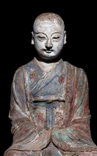 A Chinese Polychrome Painted Wood Figure of a Luohan