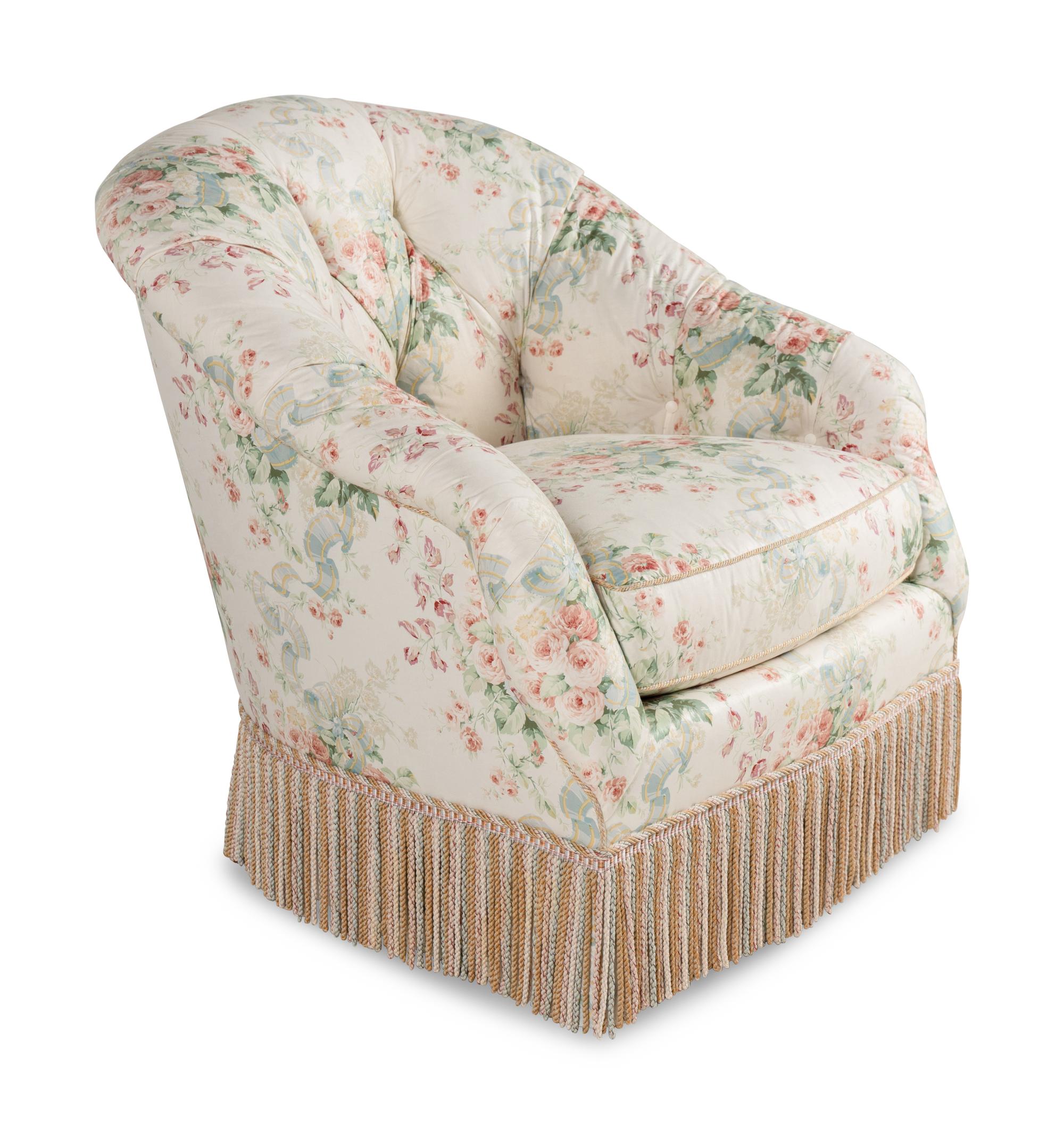 A Floral Chintz-Upholstered Lounge Chair and Ottoman