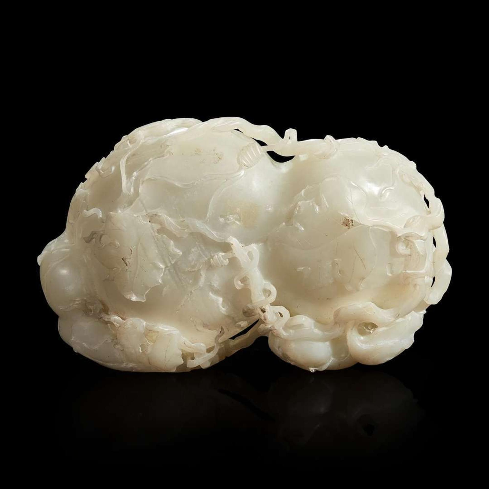A Chinese carved white jade double-gourd washer with wood stand