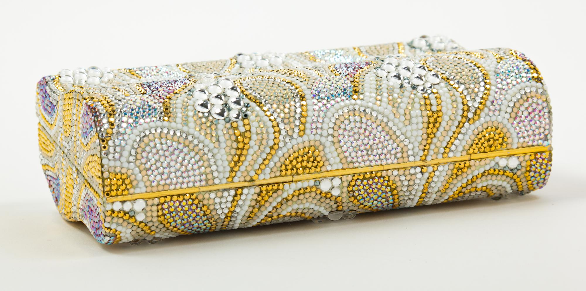A Judith Leiber Mutlticolor Paisley Minaudiere, 3"H x 5.5"W x 1.5"D; Shoulder strap: 20".