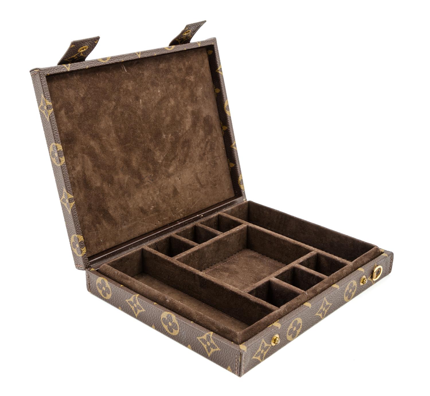 A Louis Vuitton Monogram Canvas Jewelry Box, 8.5" x 6.75" x 1.5".
