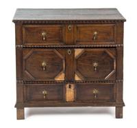 A Baroque Style Oak Chest of Drawers, 17TH CENTURY, Height 33 1/2 inches. — 17TH CENTURY,