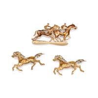 COLLECTION OF YELLOW GOLD AND DIAMOND HORSE BROOCHES