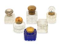 A Group of Silver and Brass Mounted Crystal Inkwells