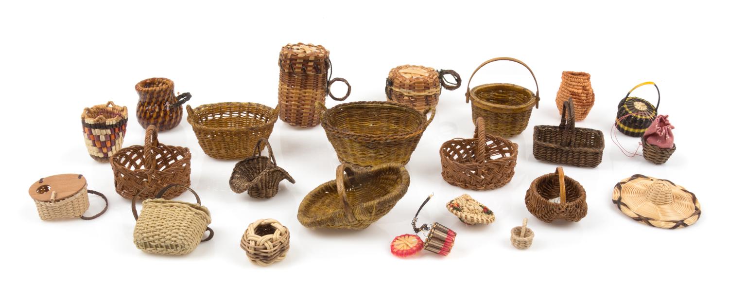 A Collection of Baskets Width of widest 2 1/2 inches.