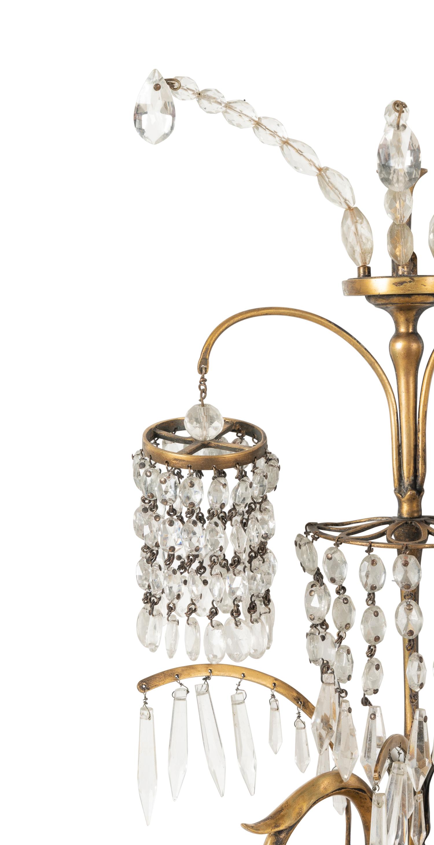 A Pair of Regency Style Gilt Metal and Glass Two-Light Sconces