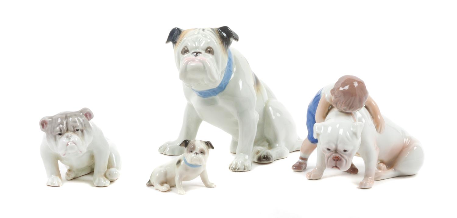 A Group of Four Porcelain Bulldog Figures Height of tallest 5 1/4 inches.