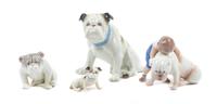A Group of Four Porcelain Bulldog Figures Height of tallest 5 1/4 inches.