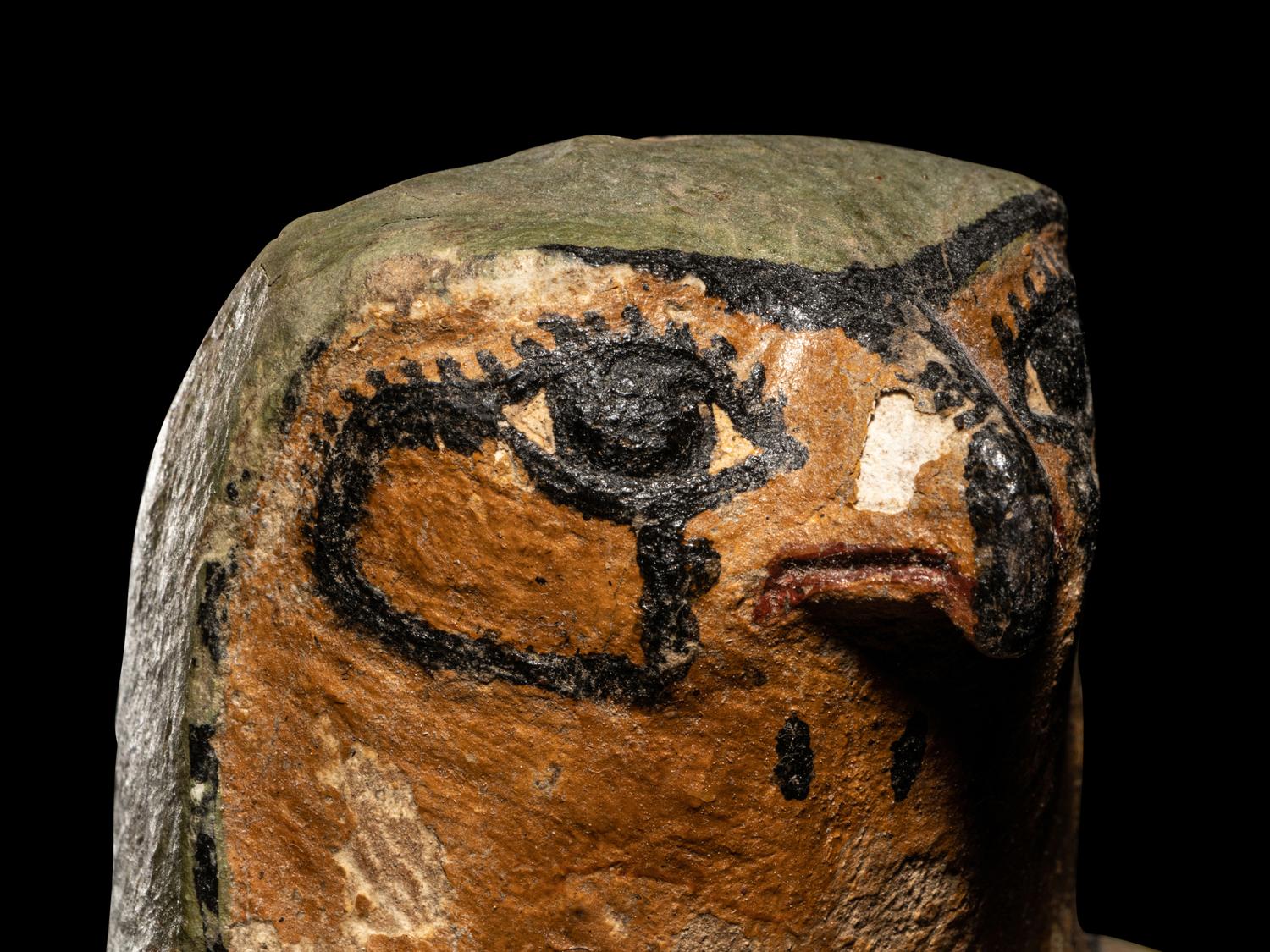 An Egyptian Painted Wood Falcon