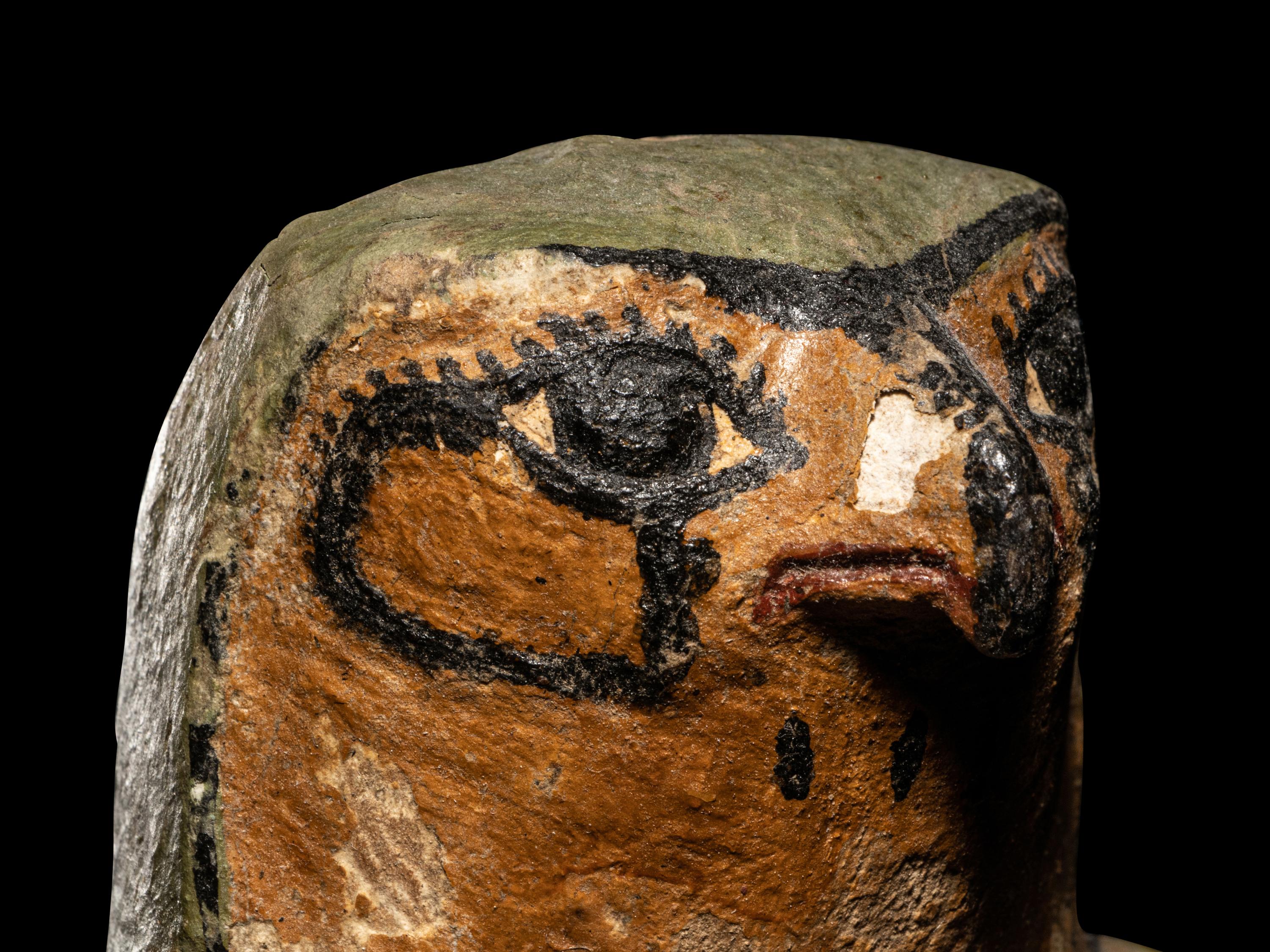 An Egyptian Painted Wood Falcon