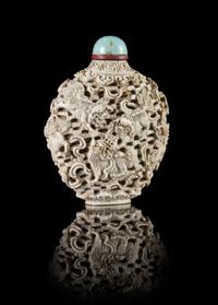 A White Glazed Molded Porcelain Snuff Bottle — JIAQING PERIOD (1796-1820)