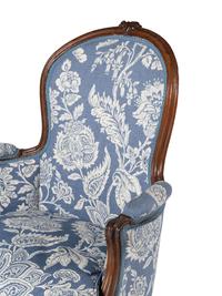 A Pair of Louis XV Walnut Bergères