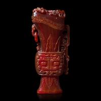 A Chinese Carved Amber Archaistic Gong Vase and Cover, Late Qing Dynasty 清晚期 琥珀仿古觥