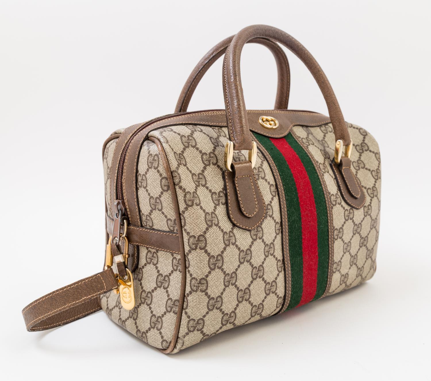 A Gucci Monogram Canvas Doctor's Bag, 10.5" x 9" x 5"; Handle drop: 3".