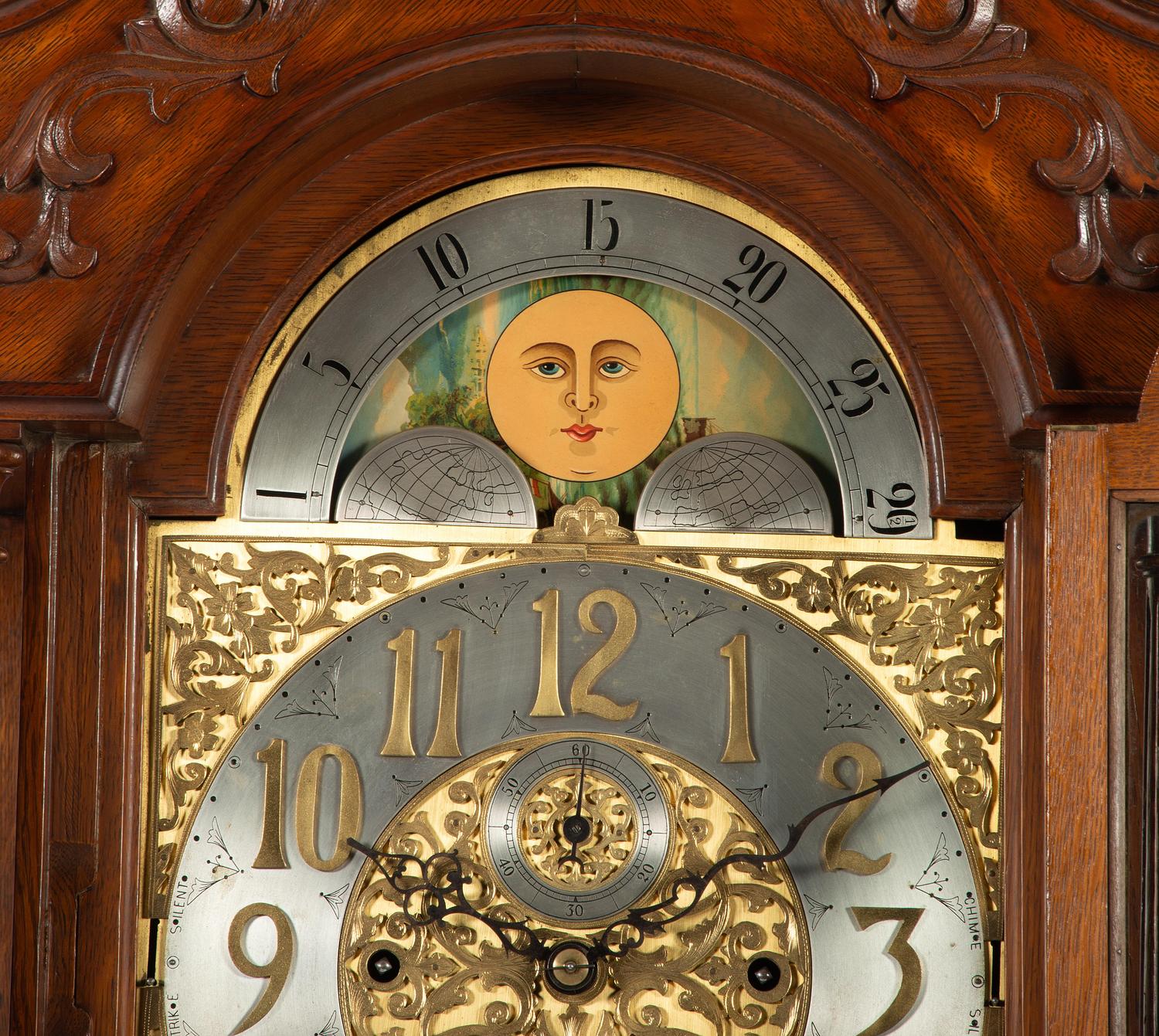 A Winterhalder and Hofmeier Oak Tall Case Clock