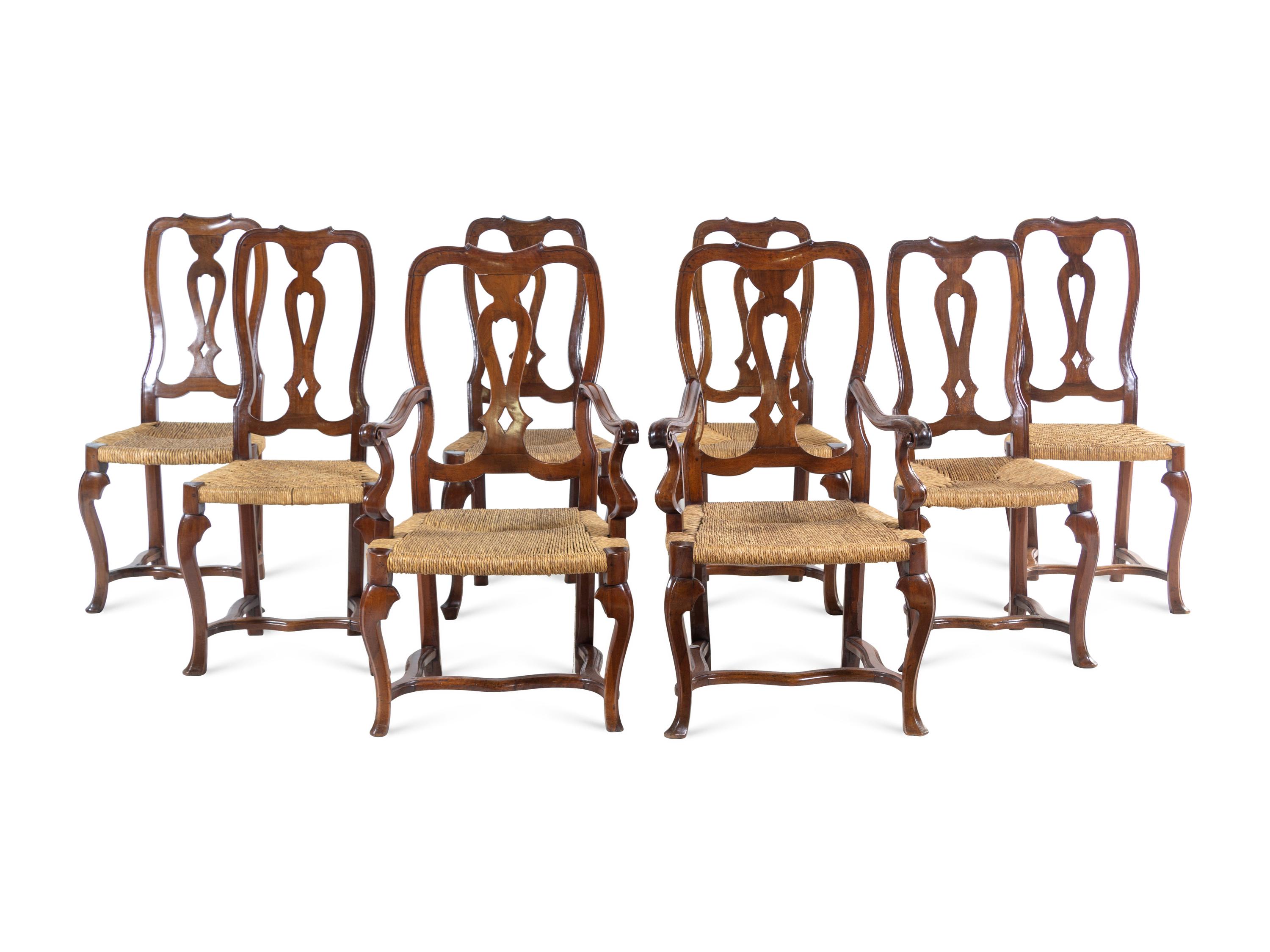 A Set of Eight Italian Walnut Rush-Seat Dining Chairs