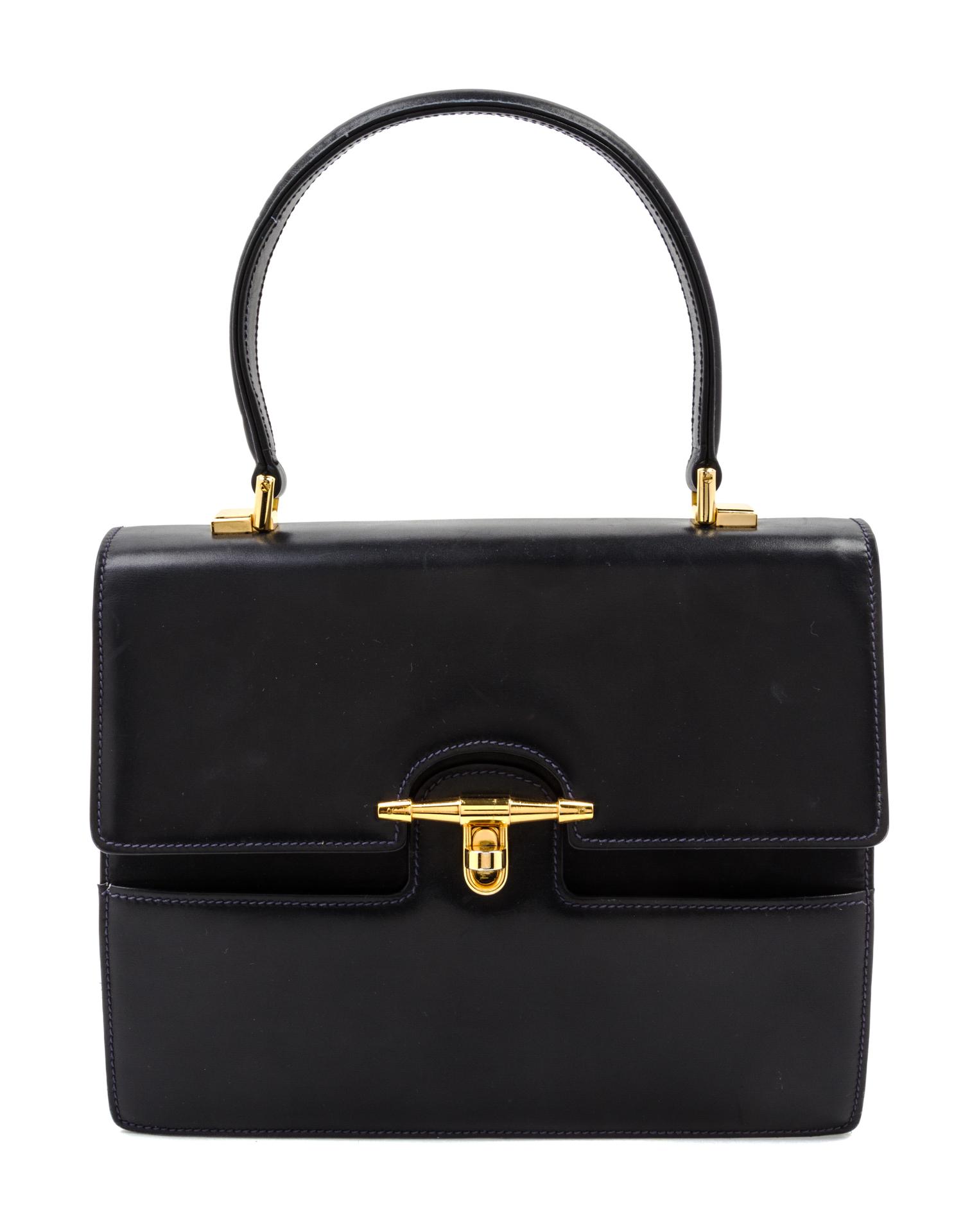 A Gucci Navy Leather Bag, 10 x 8 1/2 x 3 1/2 inches.