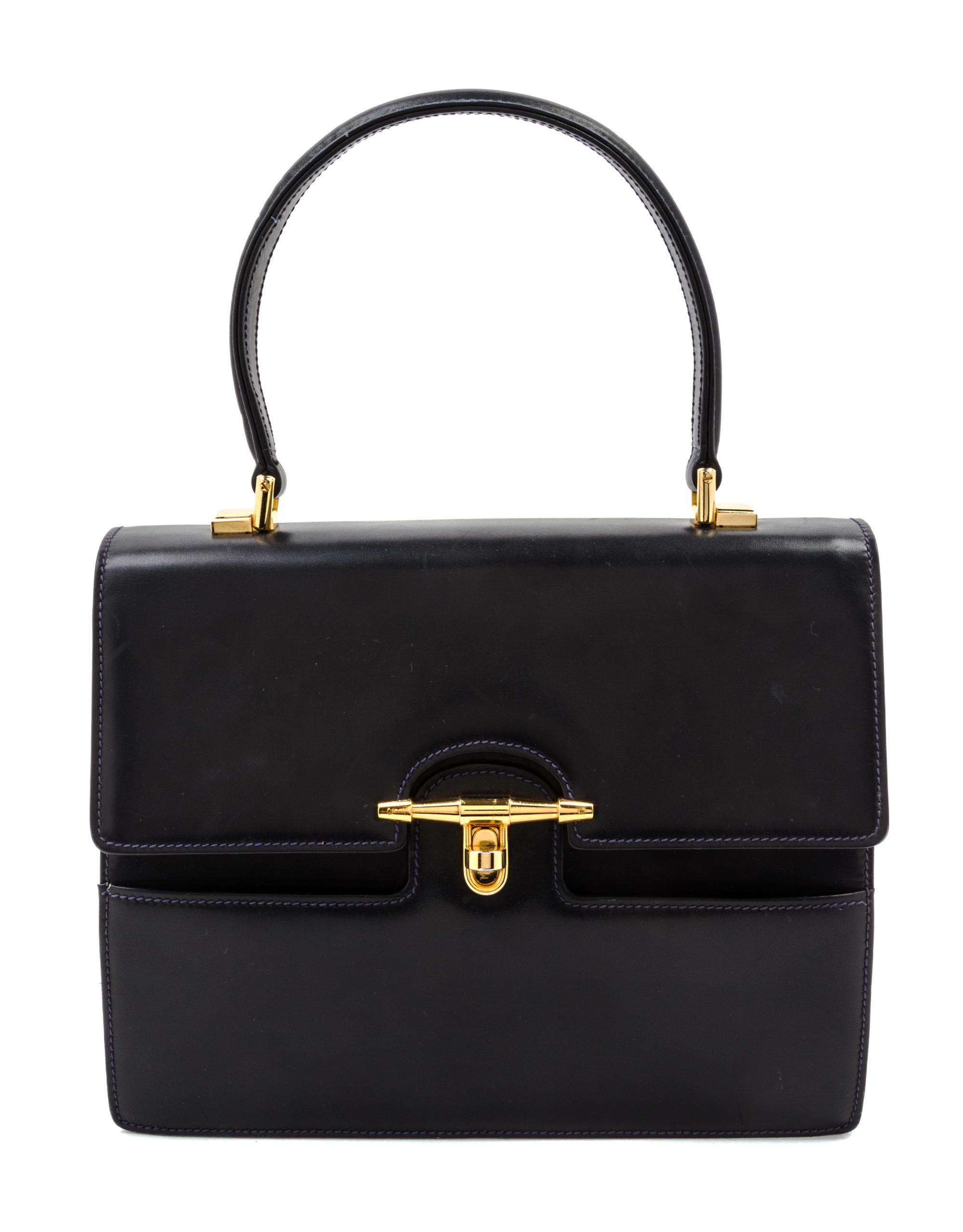 A Gucci Navy Leather Bag, 10 x 8 1/2 x 3 1/2 inches.