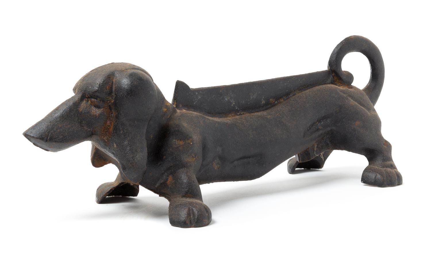 A Victorian Cast Iron Doorstop Length 14 1/4 inches.