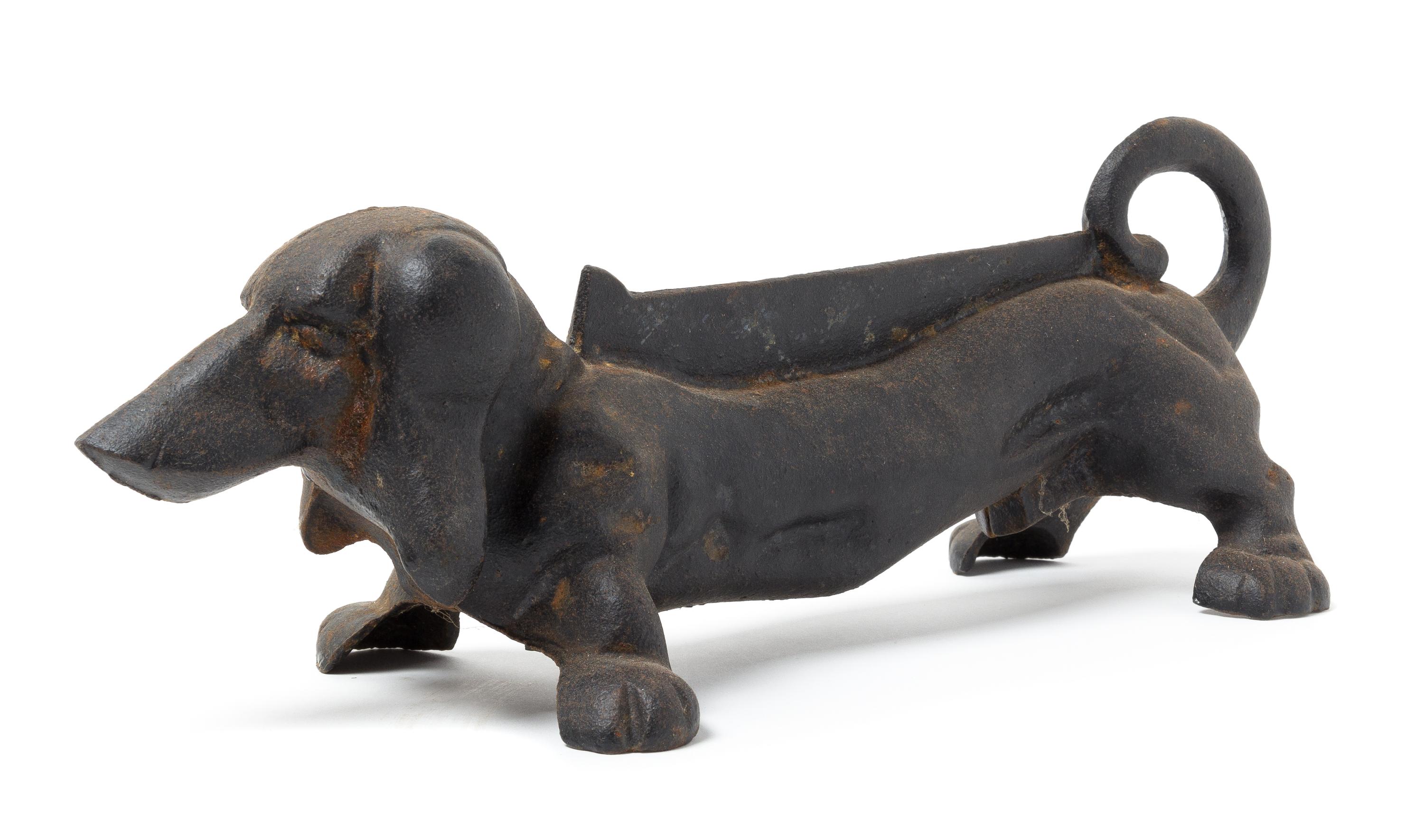 A Victorian Cast Iron Doorstop Length 14 1/4 inches.