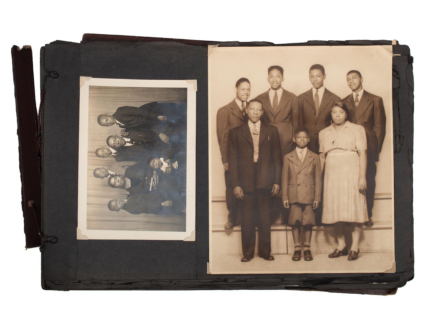[WORLD WAR II]. Photo album and insignia belonging to an African American soldier.