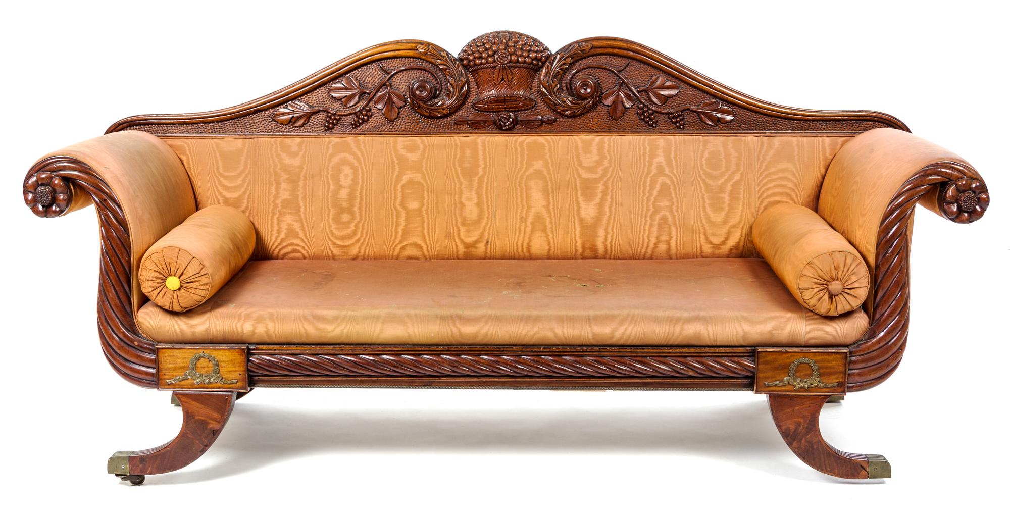 A Victorian Style Mahogany Sofa Height 35 1/2 x width 79 x depth 25 inches. — LATE 19TH CENTURY