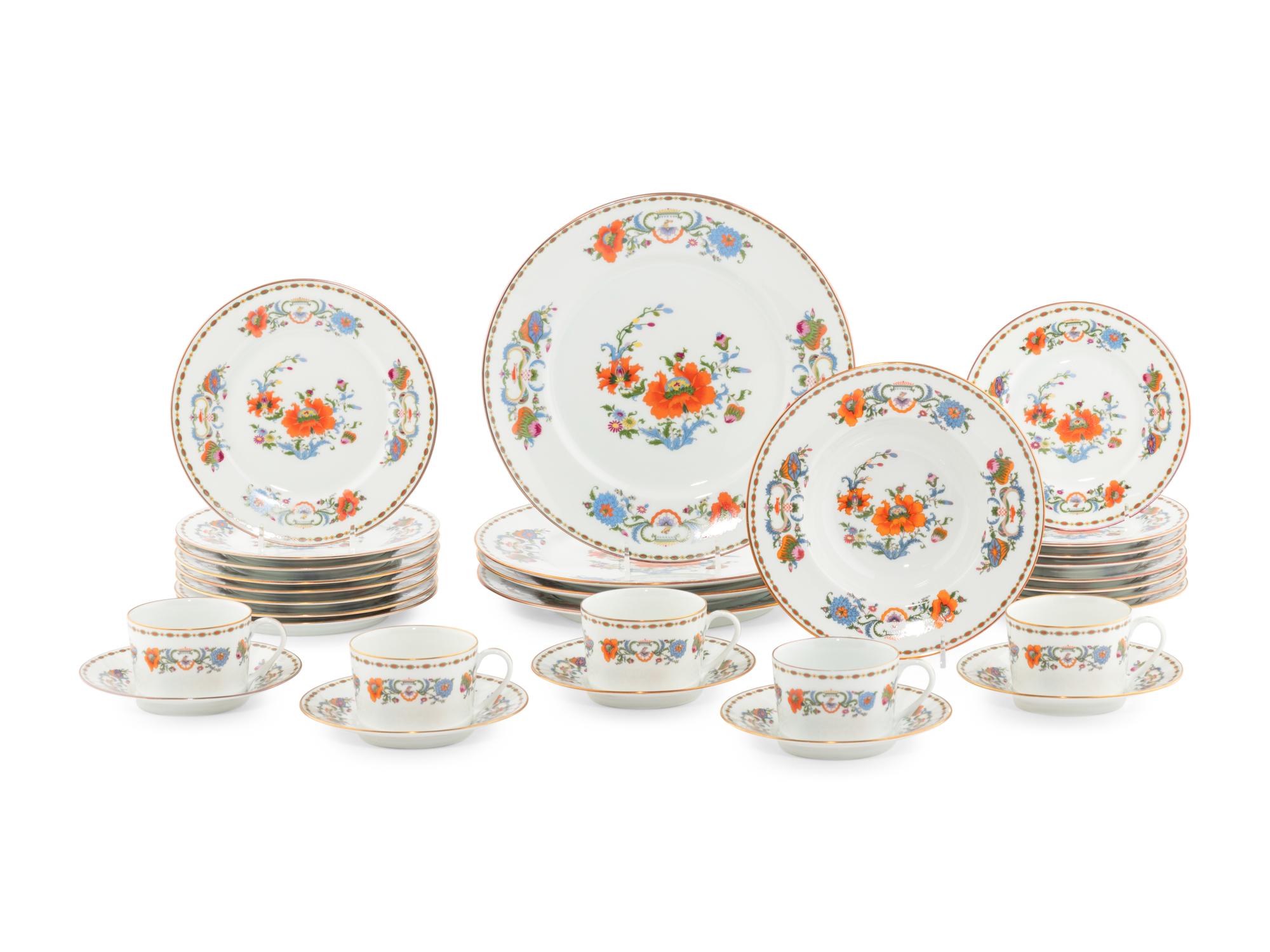 A Raynaud and Co. Limoges Porcelain Dinner Service
