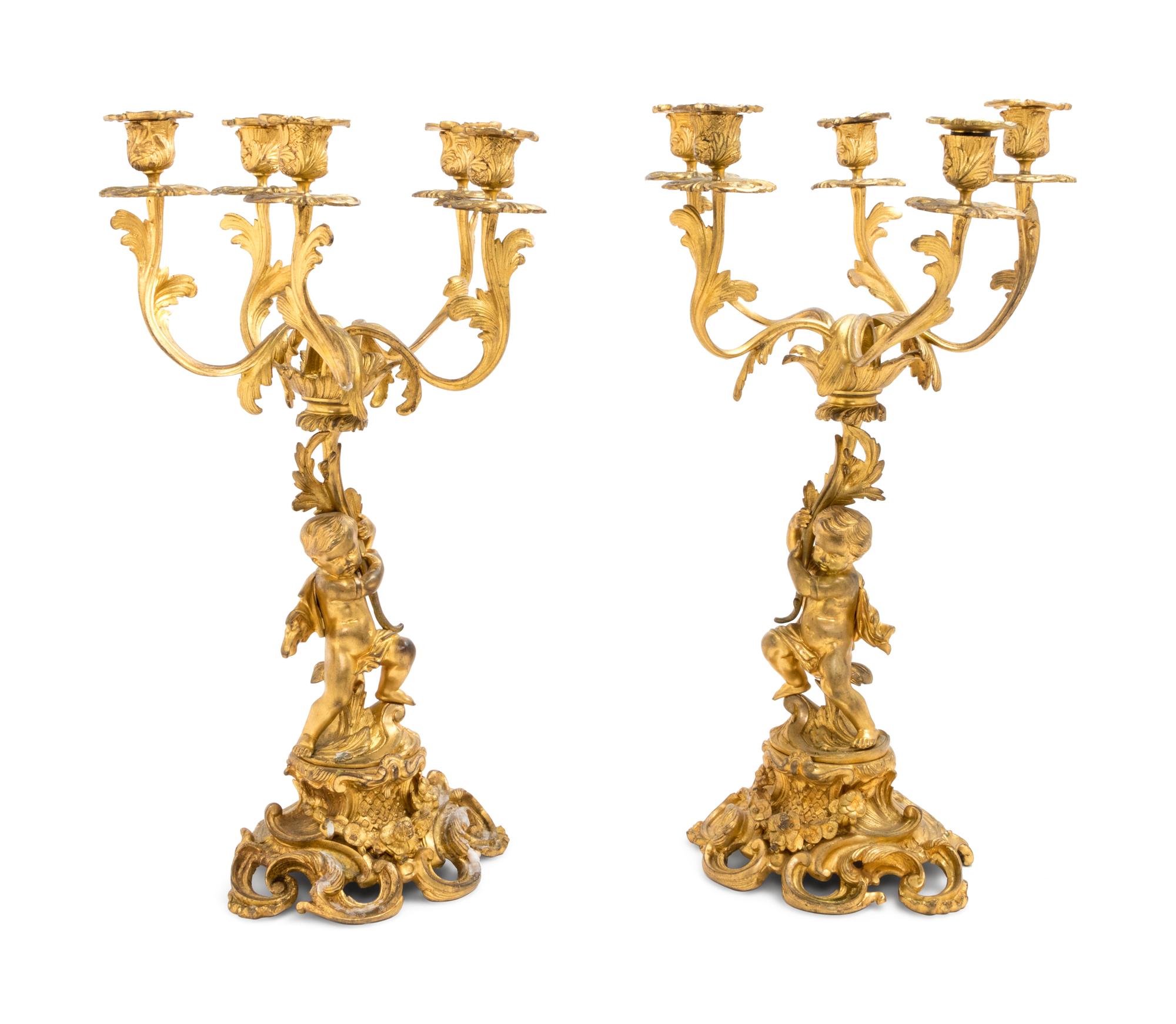 A Pair of Louis XV Style Gilt Bronze Five-Light Figural Candelabra