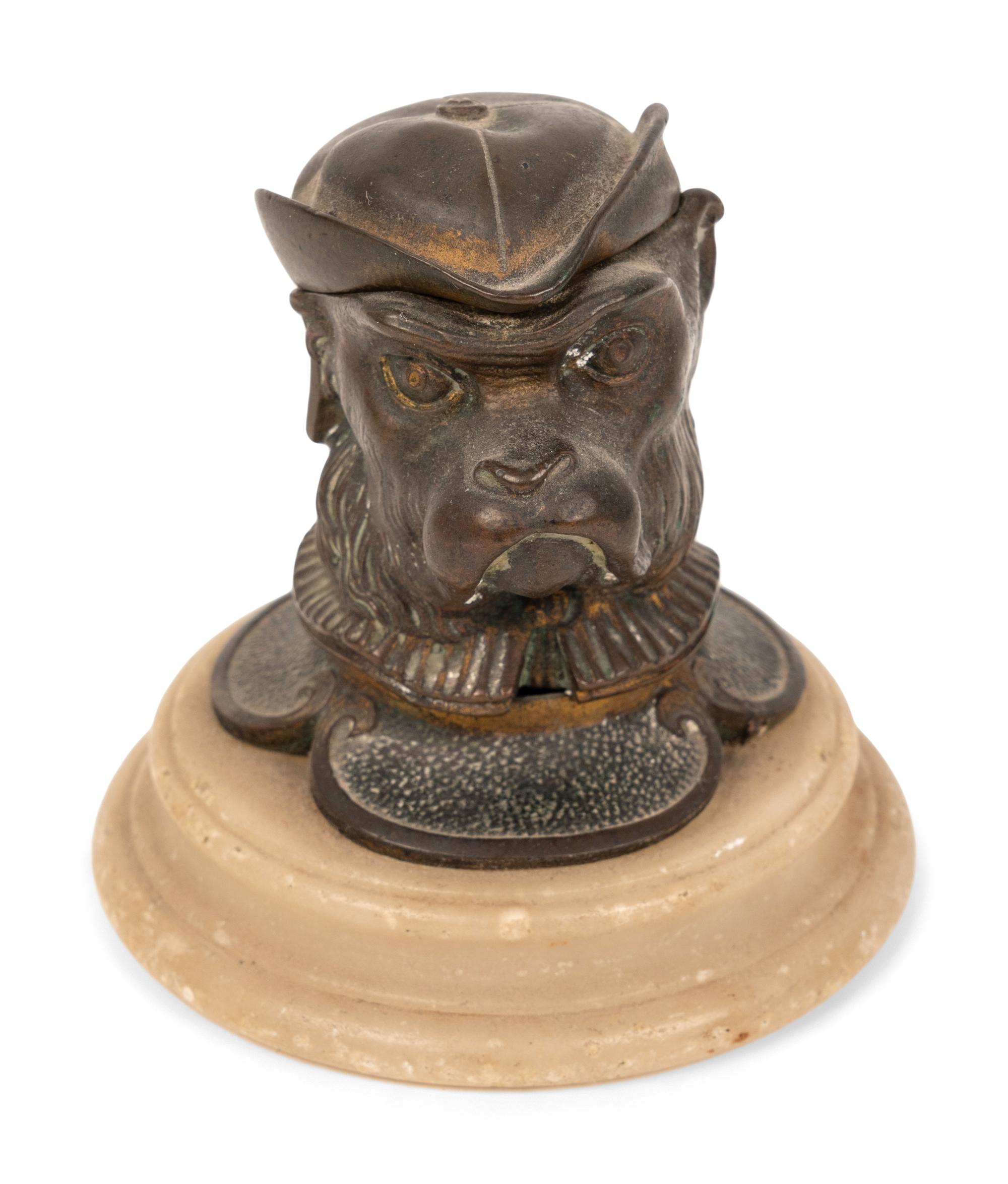A Collection of Four Dog-Themed Inkwells