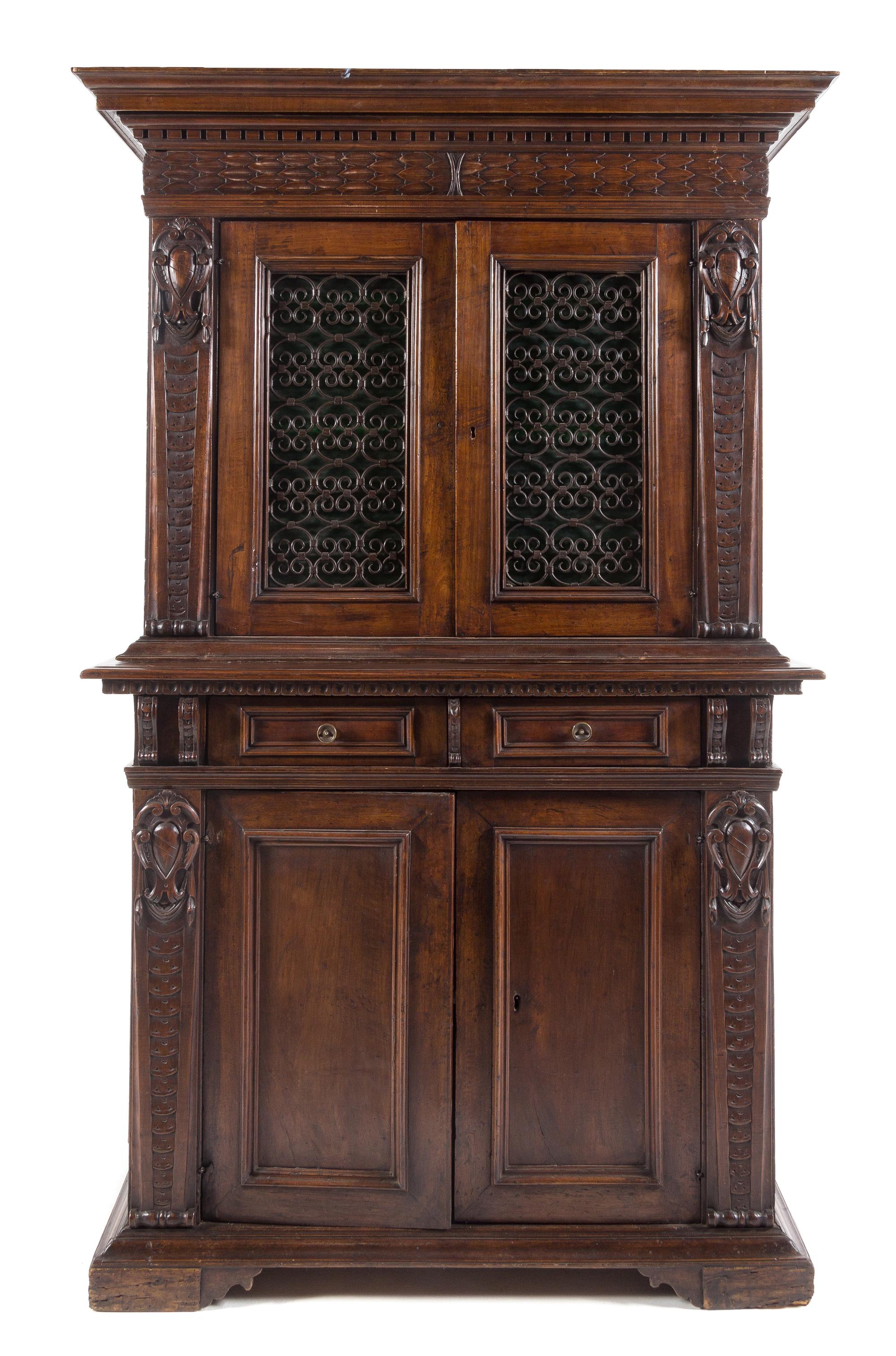 An Italian Renaissance Style Walnut Cabinet Height 79 1/2 x width 48 1/2 x depth 19 7/8 inches. — 17TH CENTURY AND LATER
