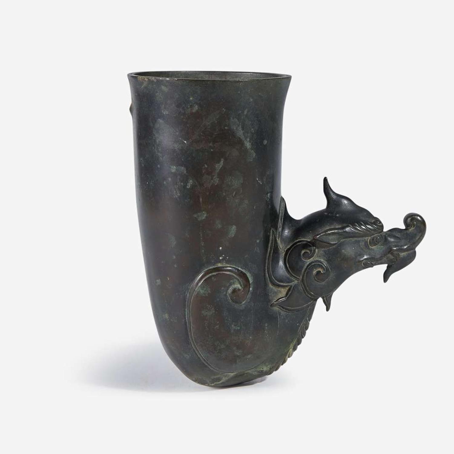 A patinated bronze rhyton-form fitting or wall vase 来通杯形铜器 18th/early 19th century ????????