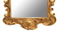 An Italian Rococo Style Giltwood Mirror