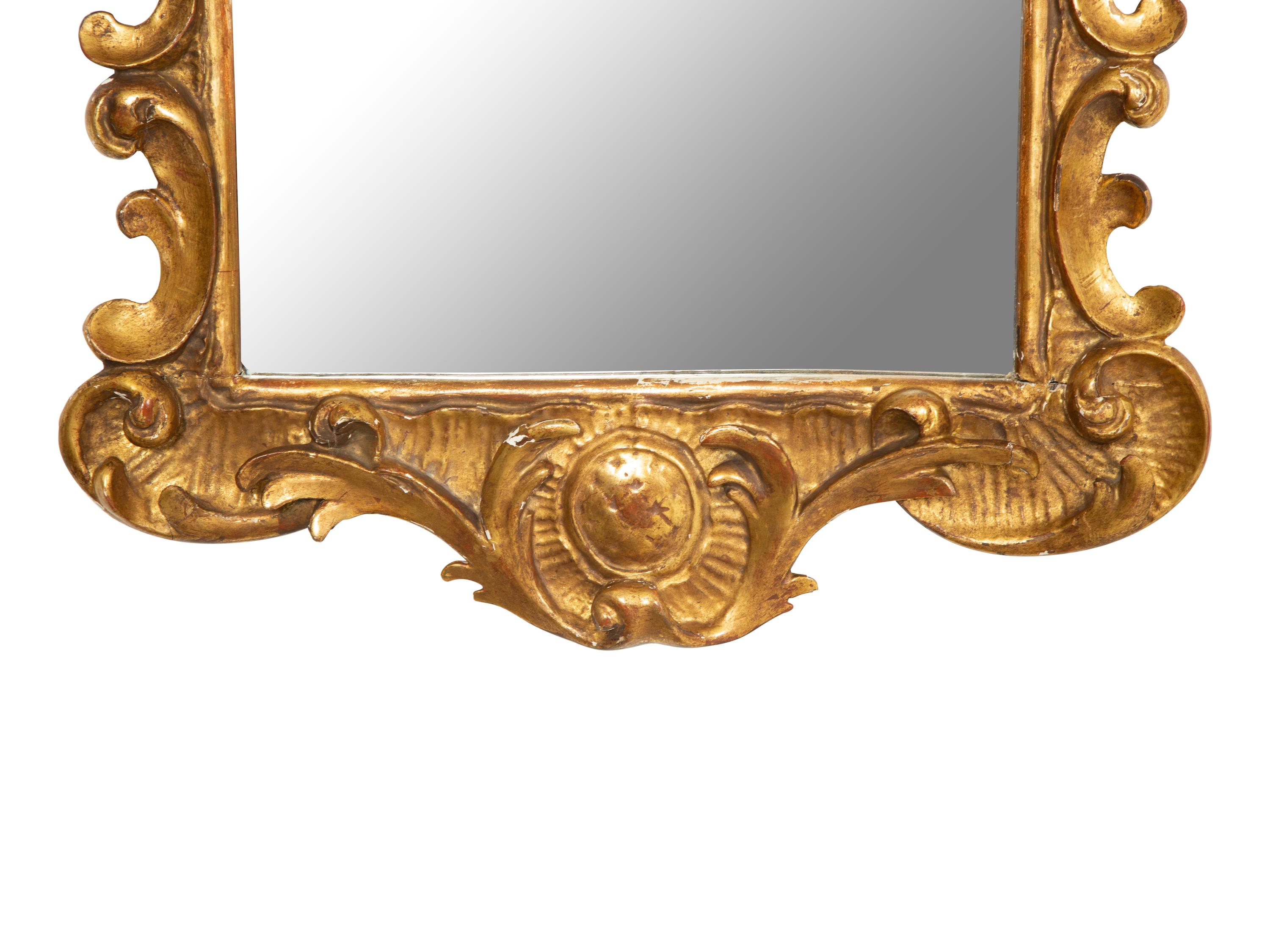 An Italian Rococo Style Giltwood Mirror