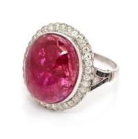 An Art Deco Platinum, Ruby, Diamond and Onyx Ring, 5.00 dwts.
