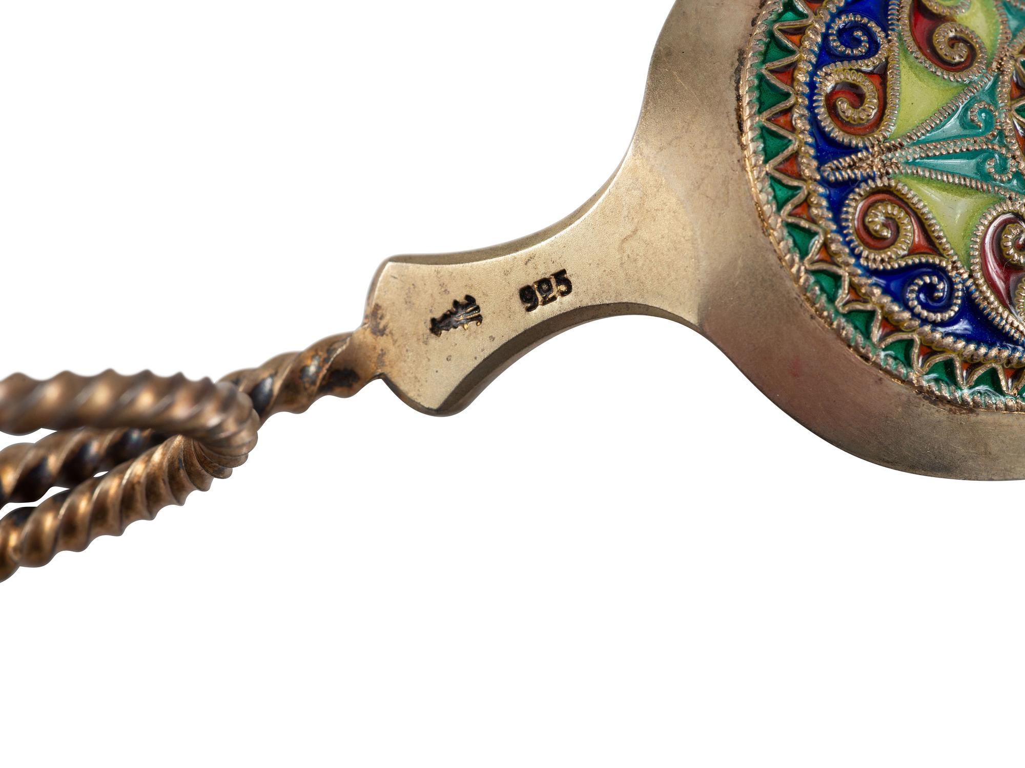 Thirty Russian Silver and Enamel Spoons and Forks