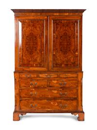 A George III Style Yewwood Veneered Linen Press — 19TH CENTURY