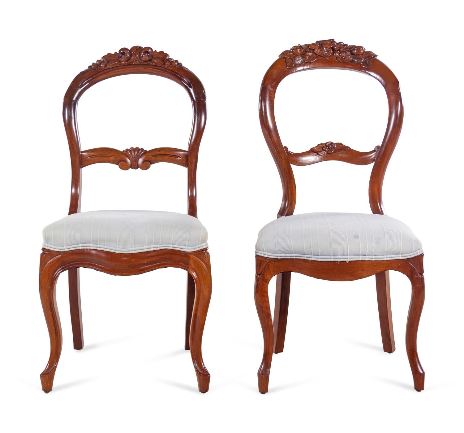 A Pair of Victorian Carved Walnut Side Chairs