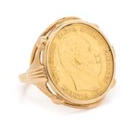 A Yellow Gold and Prussian 10 Mark Coin Ring, 5.10 dwts.