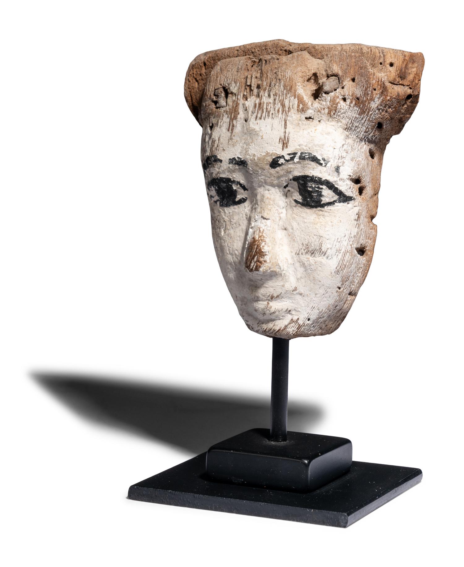 An Egyptian Painted Wood Mummy Mask